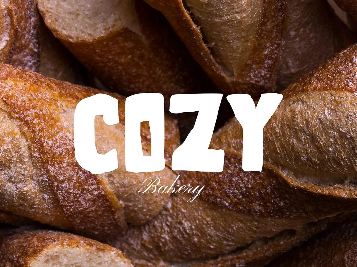 COZY bakery logotype over fresh bread